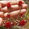 Trendilook Premium Quality Party Wear Patel Shape Red Crystal Drop Earring